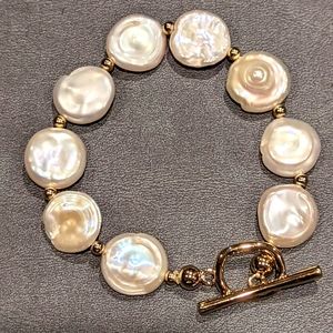 Coin shaped fresh water cultured pearl bracelet set in gold plated silver